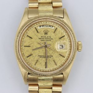 Rolex Day-Date 1807 Champagne Linen Dial 18K Barked President Circa 1972